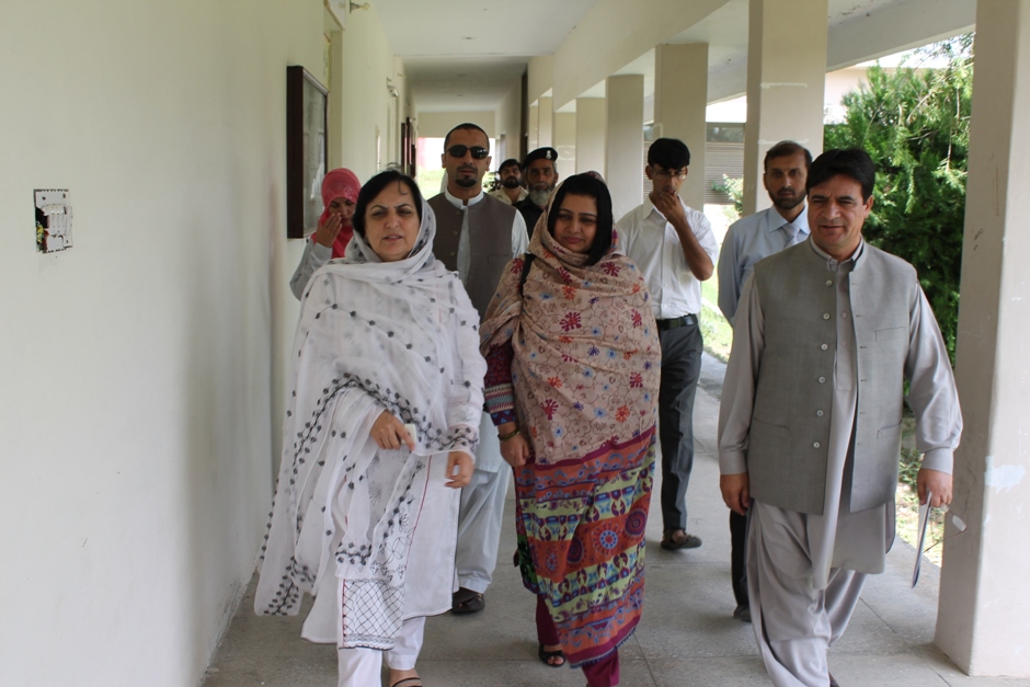 Professor Dr. Noor Jehan, Vice Chancellor along with Prof. Dr. Razia Sultana, VC SBBWU moving towards to Asif Memorial Hall on eve of Indigenous-on-Campus Training Workshop under Modern University Governance Program of HEC on Sep 02, 2014.